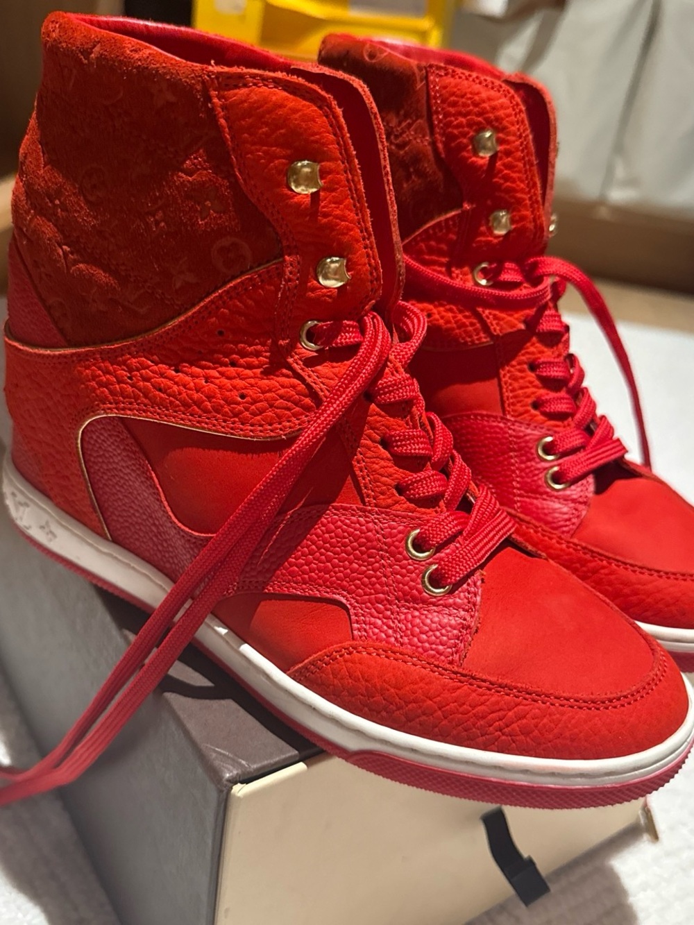 Louis Vuitton Red High-Top Sneakers with Gold-Tone Eyelets
